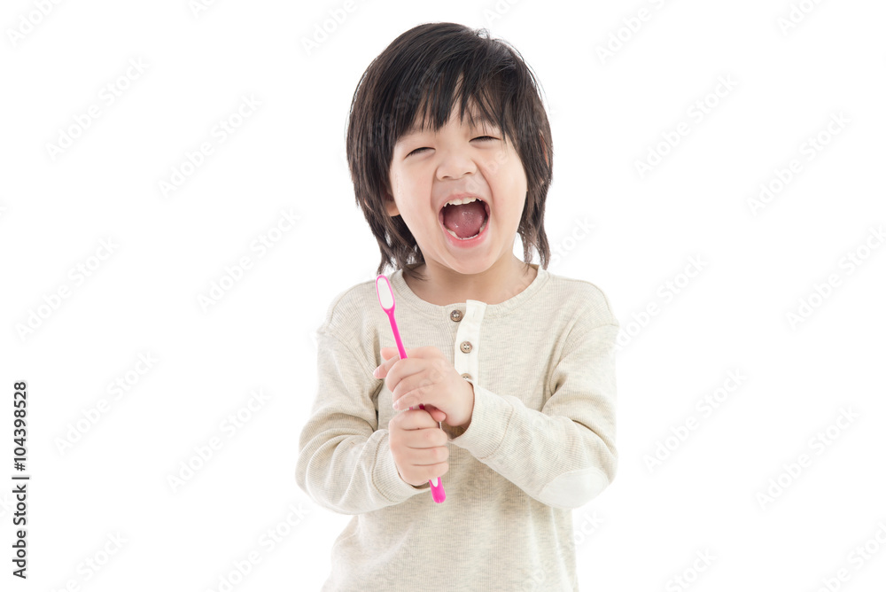 Cute asian boy brushing teeth on white background isolated Cute asian boy brushing teeth on white background isolated