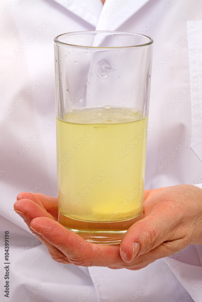 Dissolving a tablet in a glass of water Dissolving a tablet in a glass of water