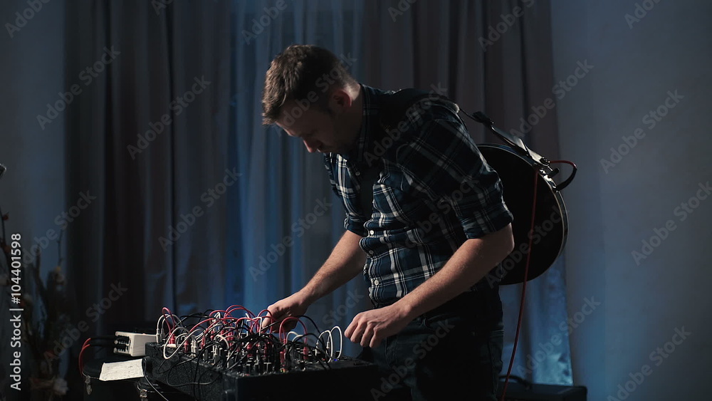 knobs on analog synthesizer music equipment