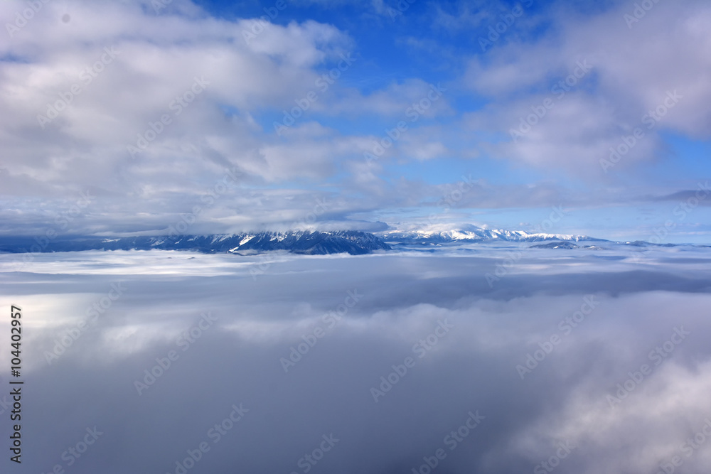 Obraz premium sea fog covers the mountain - Bucegi mountains, Romania
