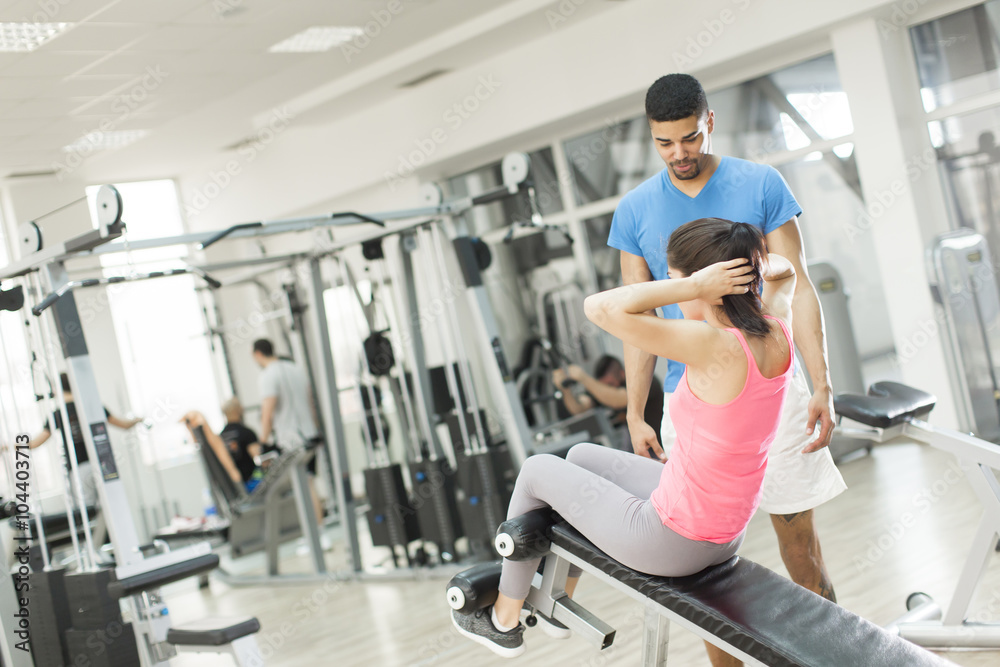 Pretty young woman training in the gym Pretty young woman training in the gym
