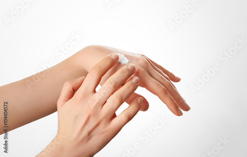 Healthy Hands.Female applying moisturizer to her Hands after bath.Skincare concept