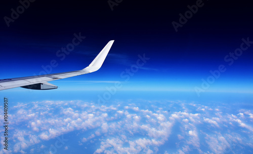 aircraft wing and cloud view from window © cupid34