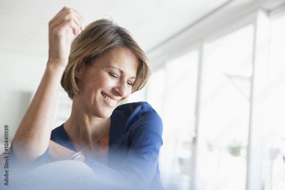 Smiling woman at home Smiling woman at home