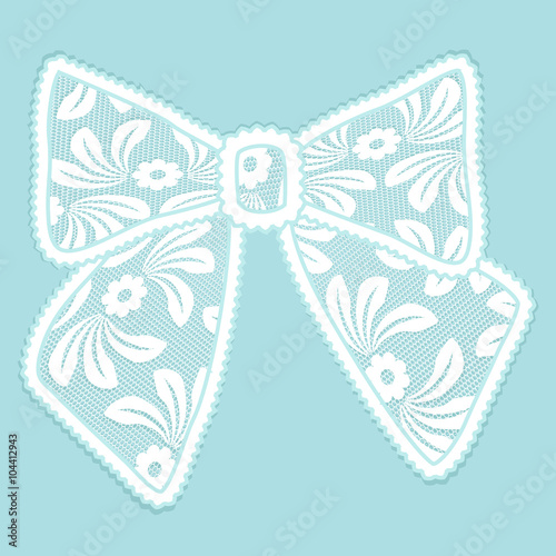 Decorative lacy bow on blue background
