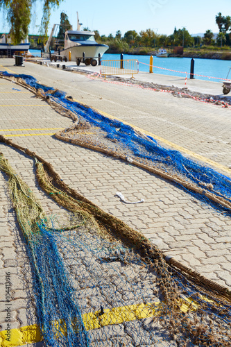 Cullera port nets in Xuquer Jucar river of Valencia photo