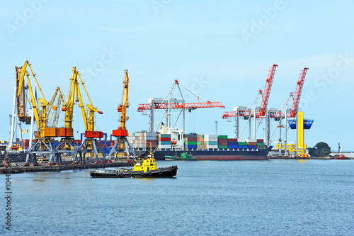 Tugboat and port cargo crane