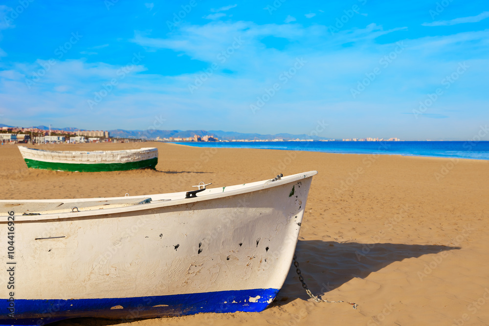 Fototapeta premium Valencia La Malvarrosa beach boats stranded