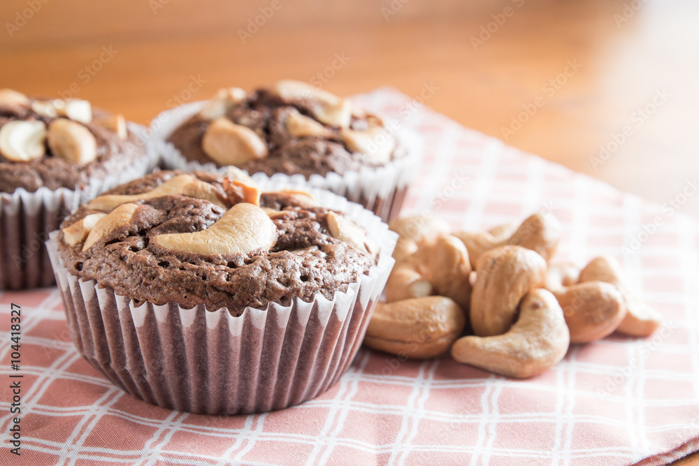 Cup of Brownies With Cashew nuts On Wooden Background Cup of Brownies With Cashew nuts On Wooden Background