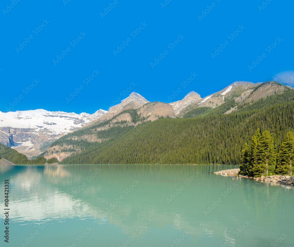 Majestic mountain lake in Canada. Louise Lake view in Banff, Alberta, Canada. Rocky Mountains.