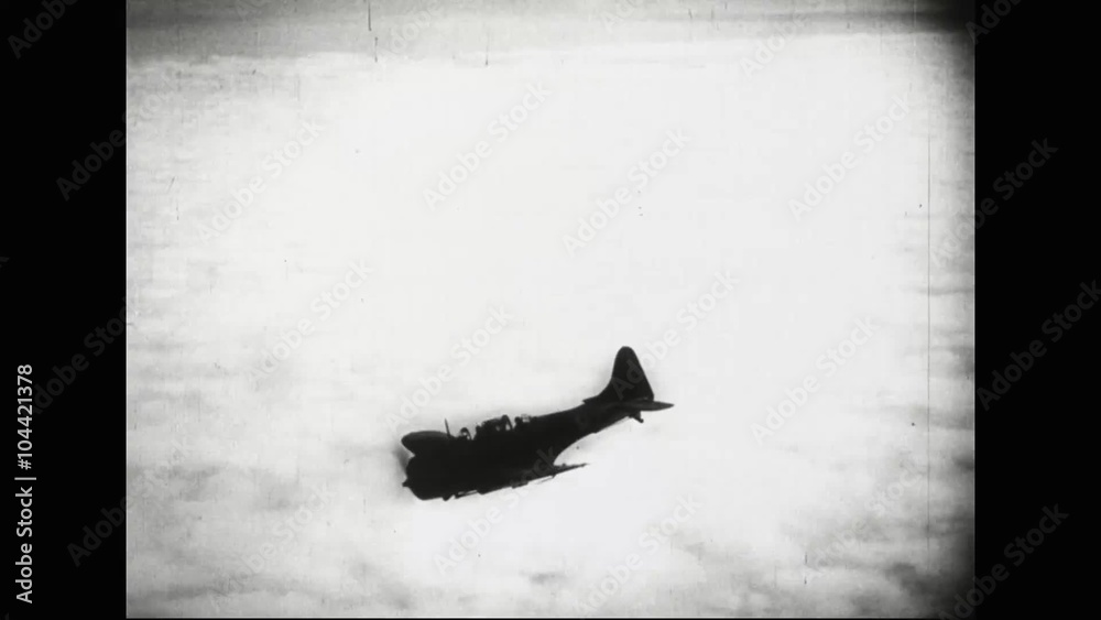 Hawaii is attacked on December 7, 1941 by the Japanese includes Japanese zero airplanes in flight.