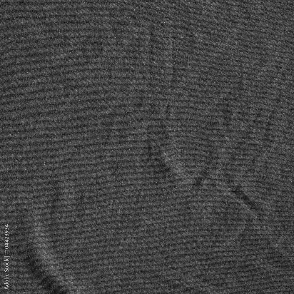 Naklejka premium Black canvas with delicate striped pattern, crumpled.