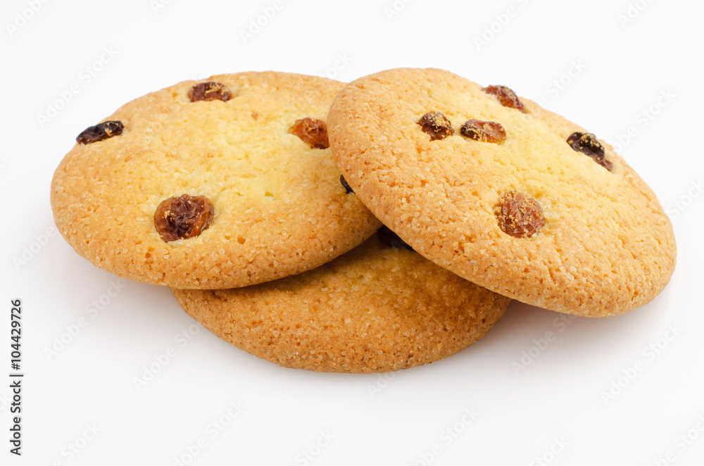 Confectionery theme. Cookies with raisins on a white background. Closeup Confectionery theme. Cookies with raisins on a white background. Closeup