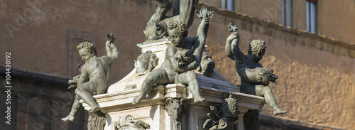 angels shapes on fountain in Bologna in Italy