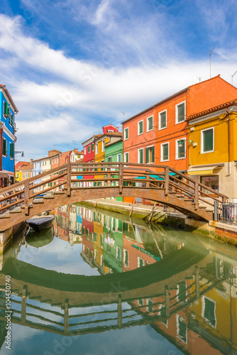 Lovely bridge on the canal of Venice, Burano. © karamysh