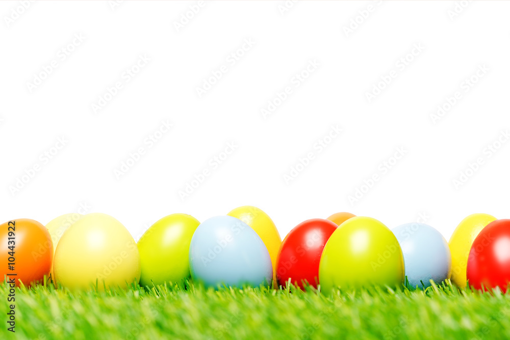 Easter eggs on grass and white background as macro Easter eggs on grass and white background as macro