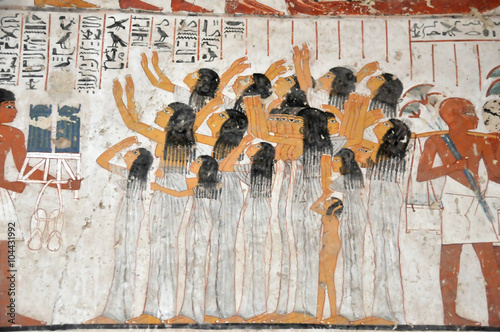 Ancient Egyptian fresco of mourners at a funeral