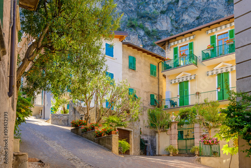 Picturesque small town street view in Limone, Lake Garda Italy. © karamysh