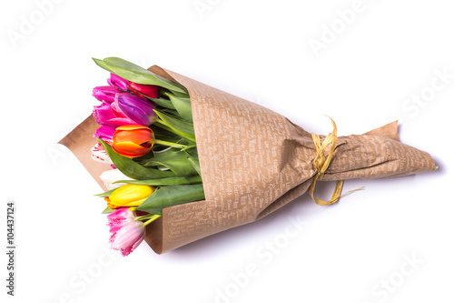 Εκτύπωση καμβά Bouquet of spring multicolor tulips flowers wrapped in present paper  isolated o
