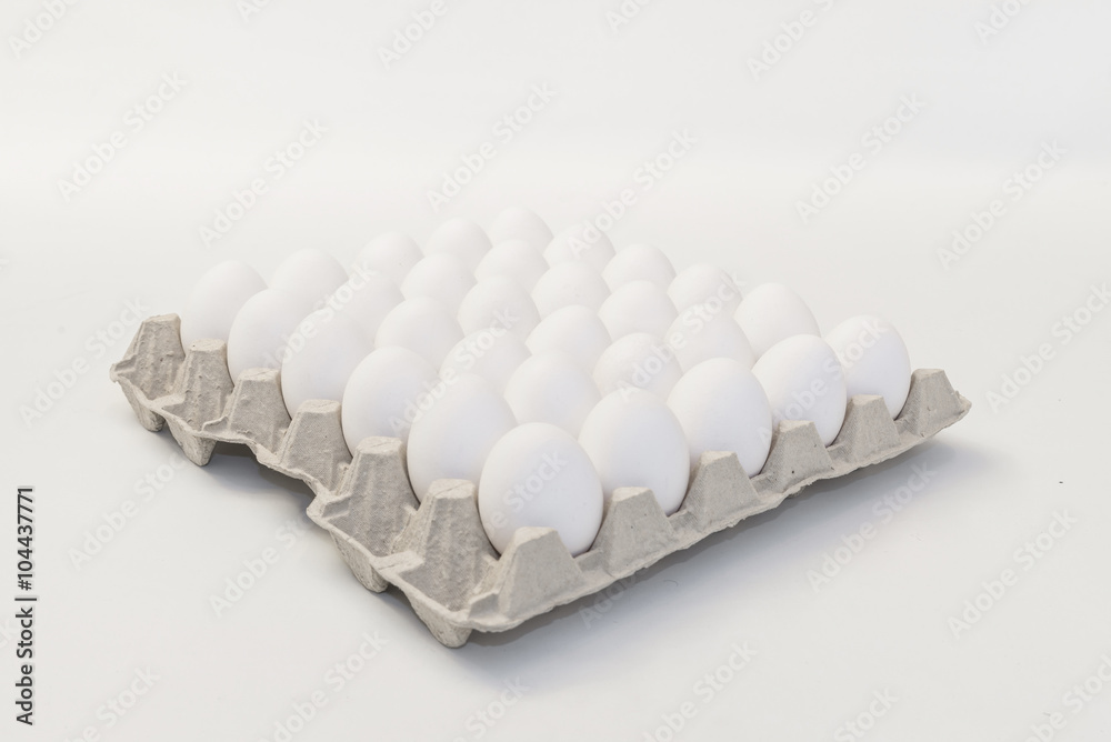 white eggs on a reclycled paper tray