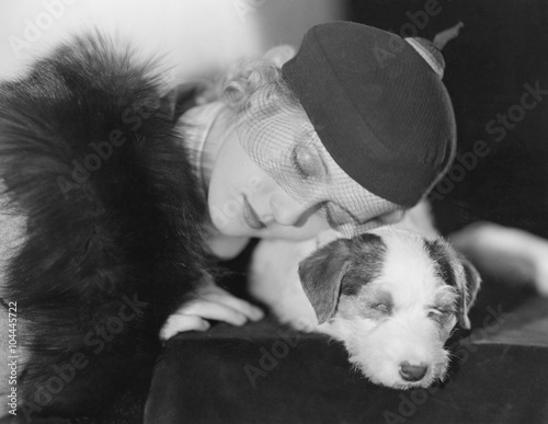 Canvas Print Portrait of woman with sleeping dog