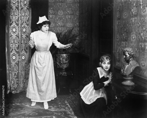 Woman caught eavesdropping at door 