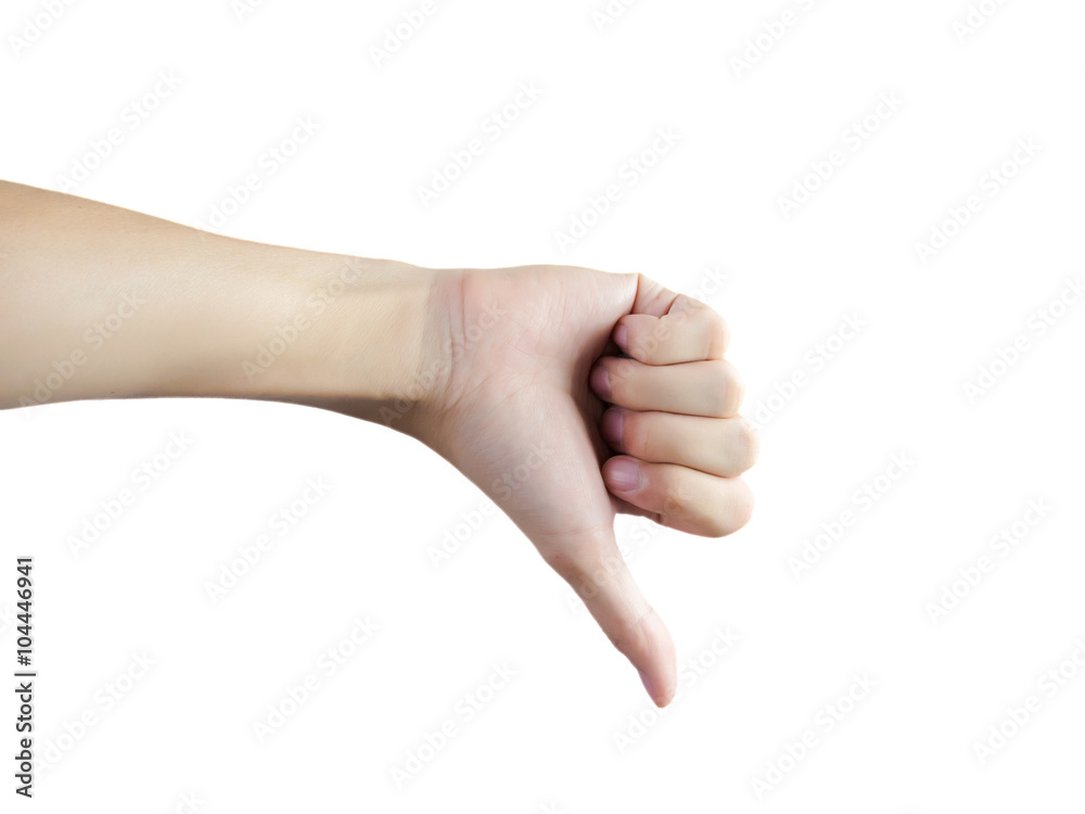 Closeup of male hand showing thumbs down sign on isolated white background with clipping path Closeup of male hand showing thumbs down sign on isolated white background with clipping path