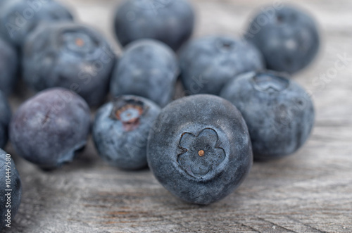 Blueberries on wooden table, selective focus