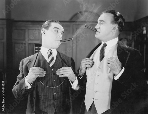 Two men smoking cigars  photo