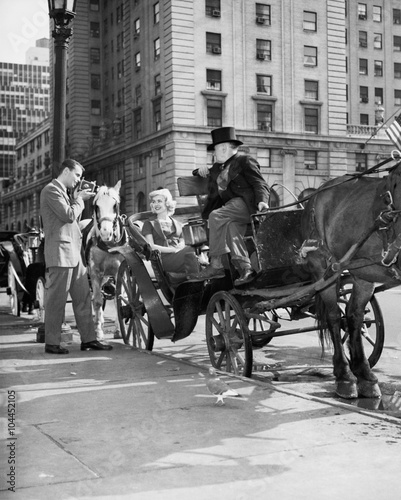 Riding in Style  carriage driver at Grand Army Plaza  getting ready to take customers through the Park  © everettovrk