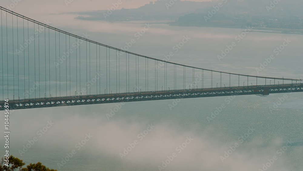 Golden Gate Bridge far shot with Clouds and City Golden Gate Bridge far shot with Clouds and City