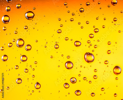 Water drops on glass of beer. Close up.