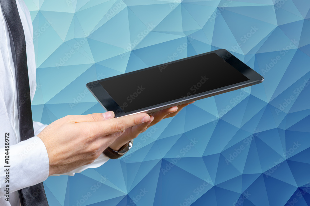 High resolution businessman holding digital tablet