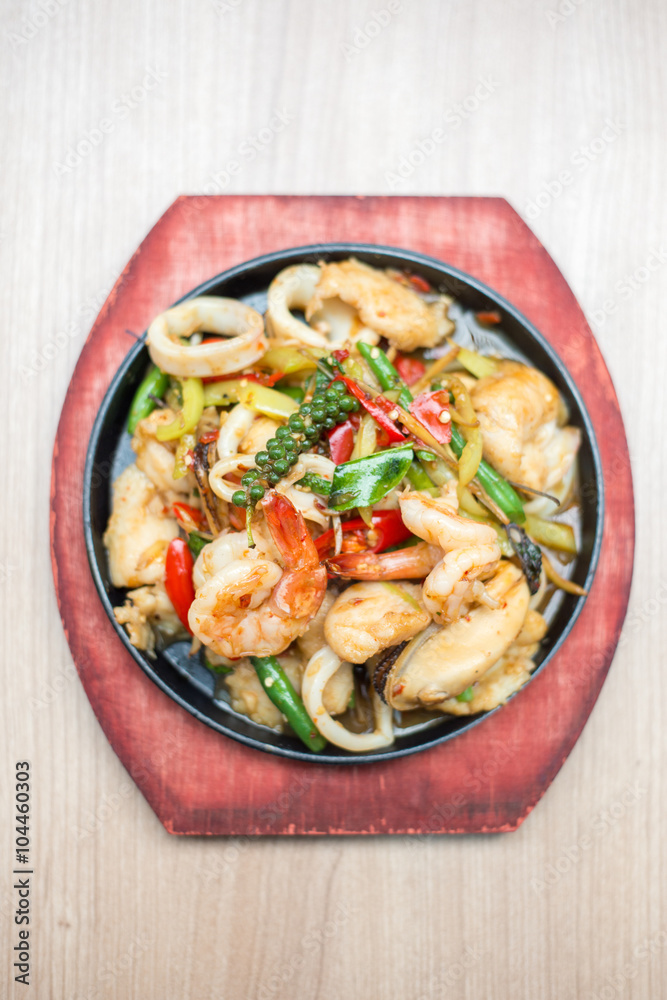 Sizzling seafood with Thai herbs. Sizzling seafood with Thai herbs.