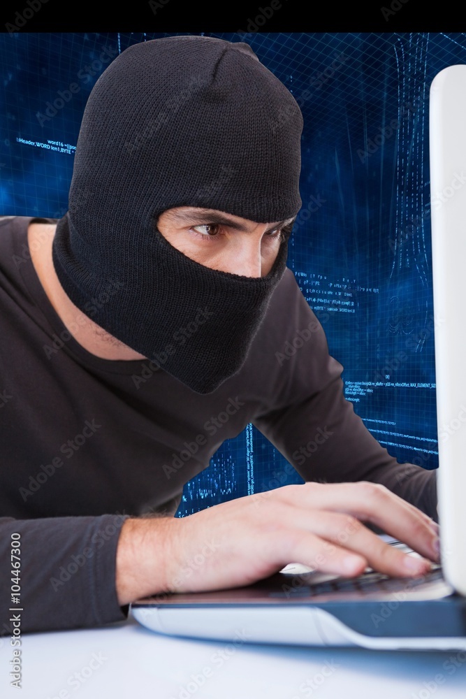 Hacker using laptop Hacker using laptop