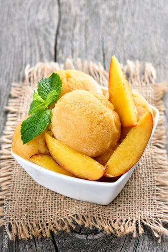 Peach sorbet decorated with mint