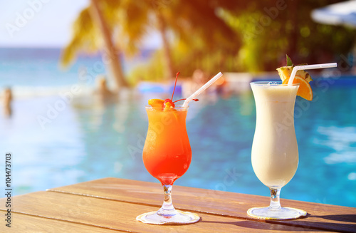 Fototapeta Naklejka Na Ścianę i Meble -  Two cocktails on luxury tropical beach
