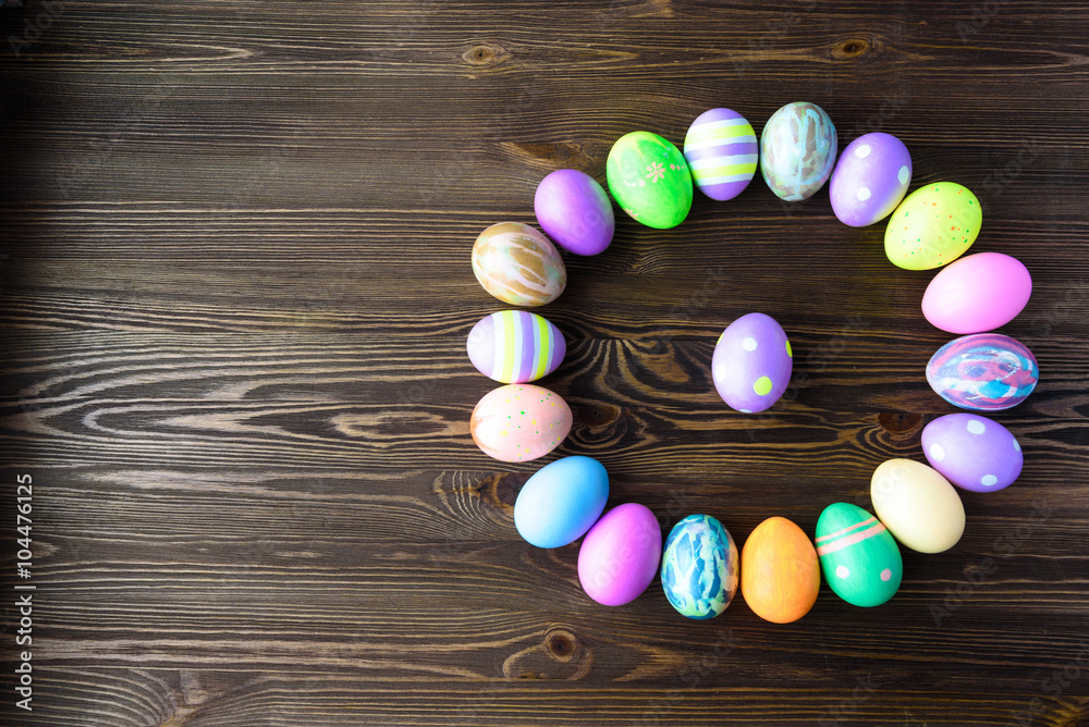 Obraz premium Easter eggs on wooden background