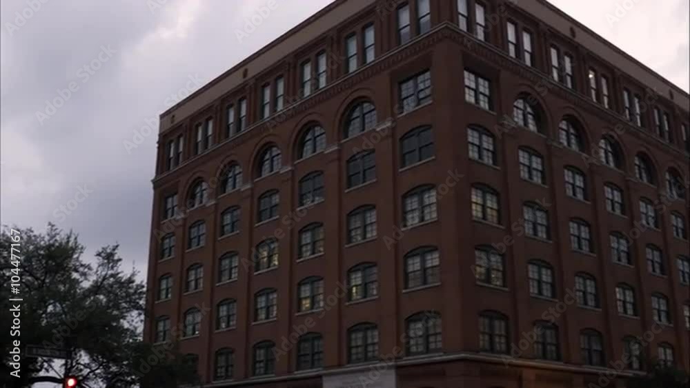 Panning left shot of the Texas School Book Depository at Dealey Plaza, Dallas, Texas. Panning left shot of the Texas School Book Depository at Dealey Plaza, Dallas, Texas.