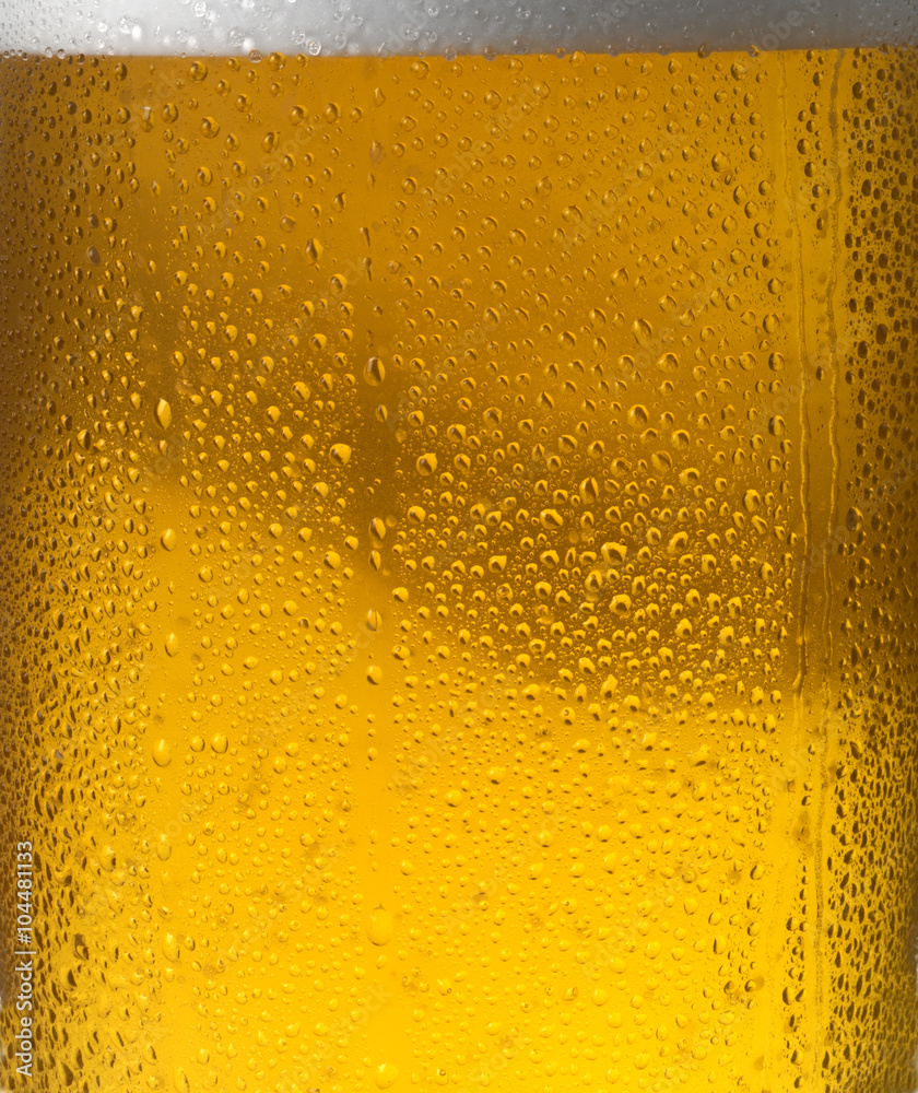 CLOSE UP OF COLD BEER CLOSE UP OF COLD BEER