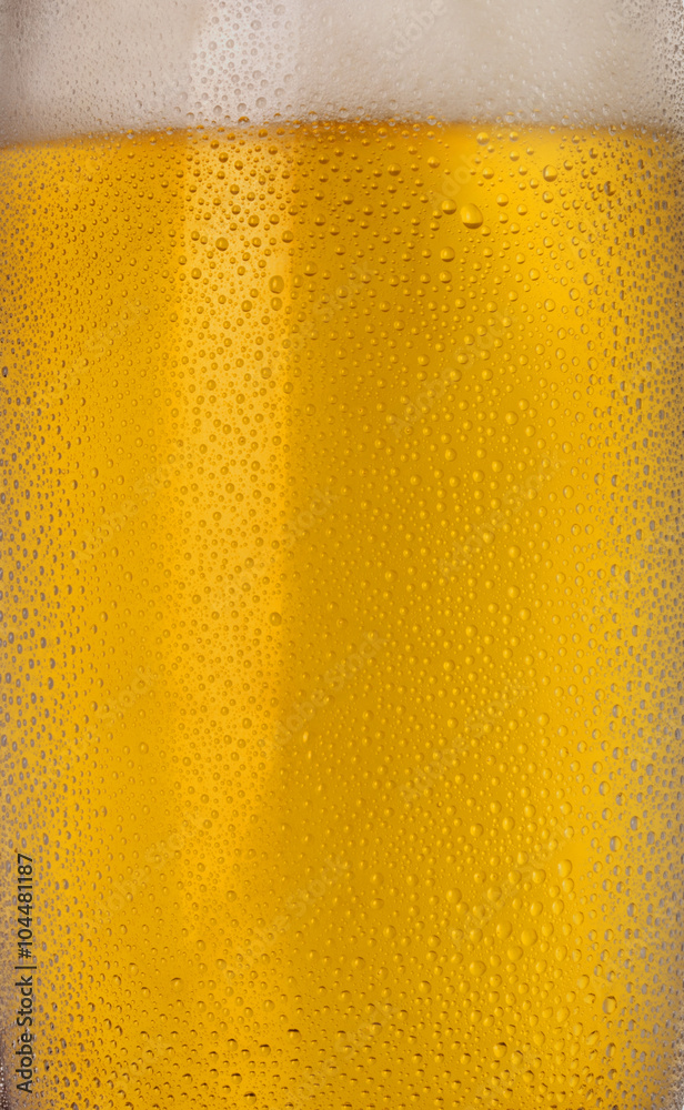 CLOSE UP OF COLD BEER CLOSE UP OF COLD BEER