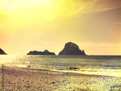 Es Vedra in the sunset  pastel colored sky at the mystic rock of Es Vedra  Ibiza Island. 