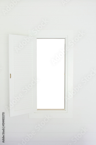 Open window with white wooden shutters