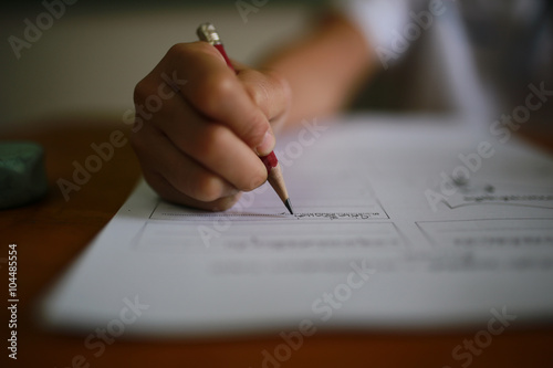 Thailand Student write his examination