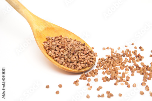 buckwheat grain in the wood spoon
