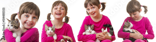 happly little girl holding a kitten photo