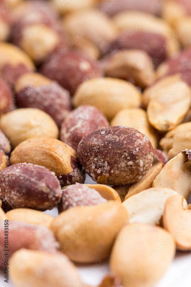 Top macro view of roasted pile of peanuts Top macro view of roasted pile of peanuts
