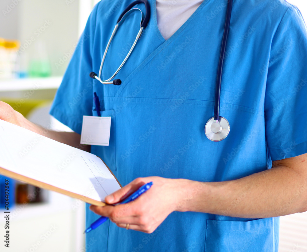 Closeup portrait of a doctor with stethoscope holding folder Closeup portrait of a doctor with stethoscope holding folder