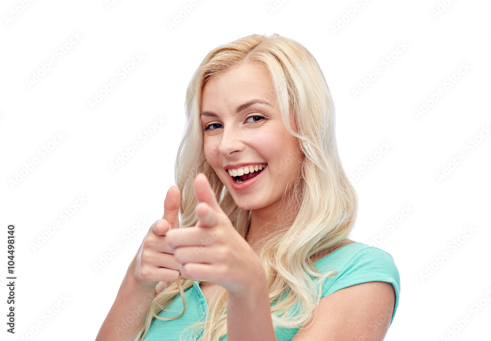 happy young woman pointing finger to you happy young woman pointing finger to you