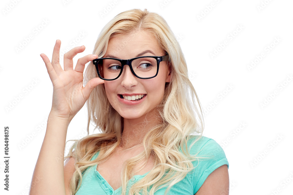happy young woman or teenage girl in glasses